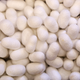 Silkworm cocoons are seen stored in a box at the CRA agricultural research unit in Padua, Italy, June 4, 2015. The Padua research unit houses some 200 different genetic types of silkworm. Clusters of silkworms munch on piles of locally-grown mulberry leaves in a white marquee in Italy's northern Veneto region. They are nourishing hopes of a revival of Italy's 1,000 year-old silk industry. Picture taken June 4, 2015. REUTERS/Alessandro Bianchi? - GF10000161345